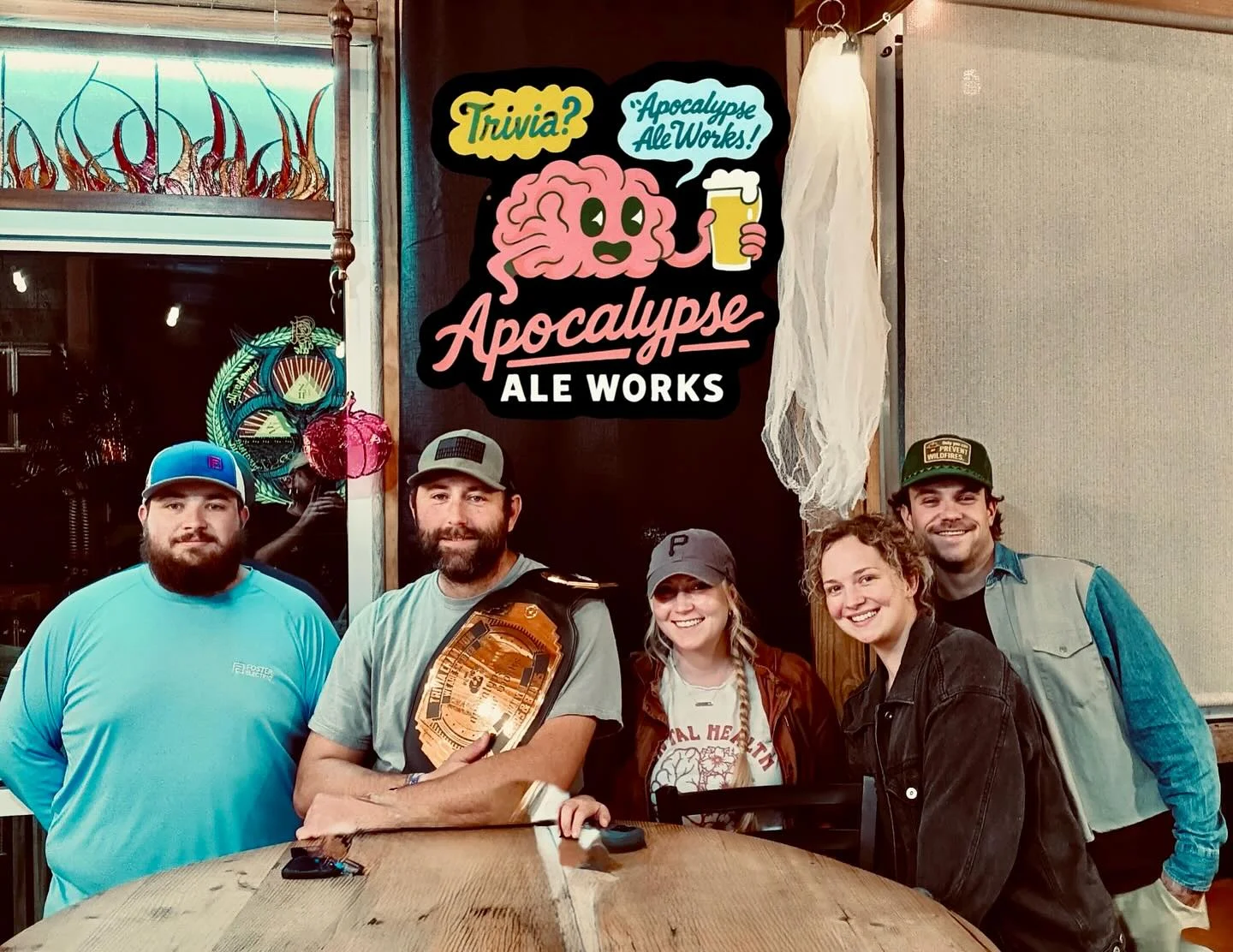 Group of friends at Apocalypse Ale Works enjoying trivia night