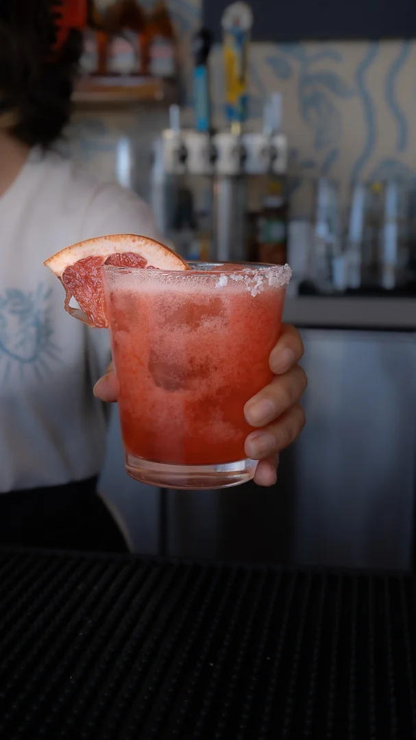 Refreshing grapefruit cocktail with salt rim