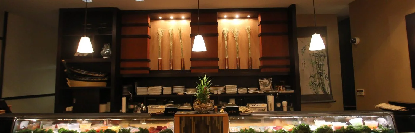 Elegant sushi bar interior with fresh seafood display