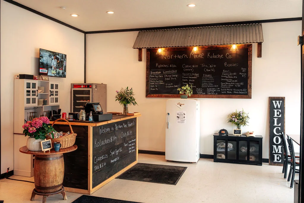 Cozy restaurant interior with chalkboard menu and welcoming decor