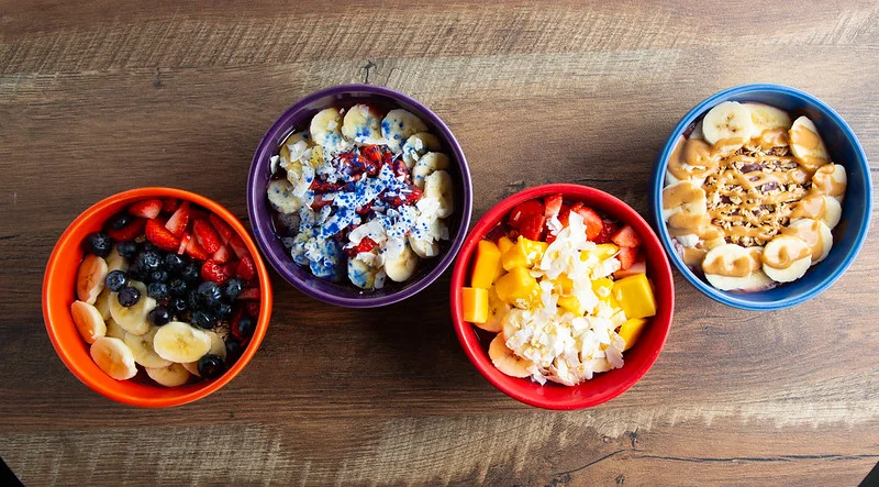 Colorful smoothie bowls with fresh fruits
