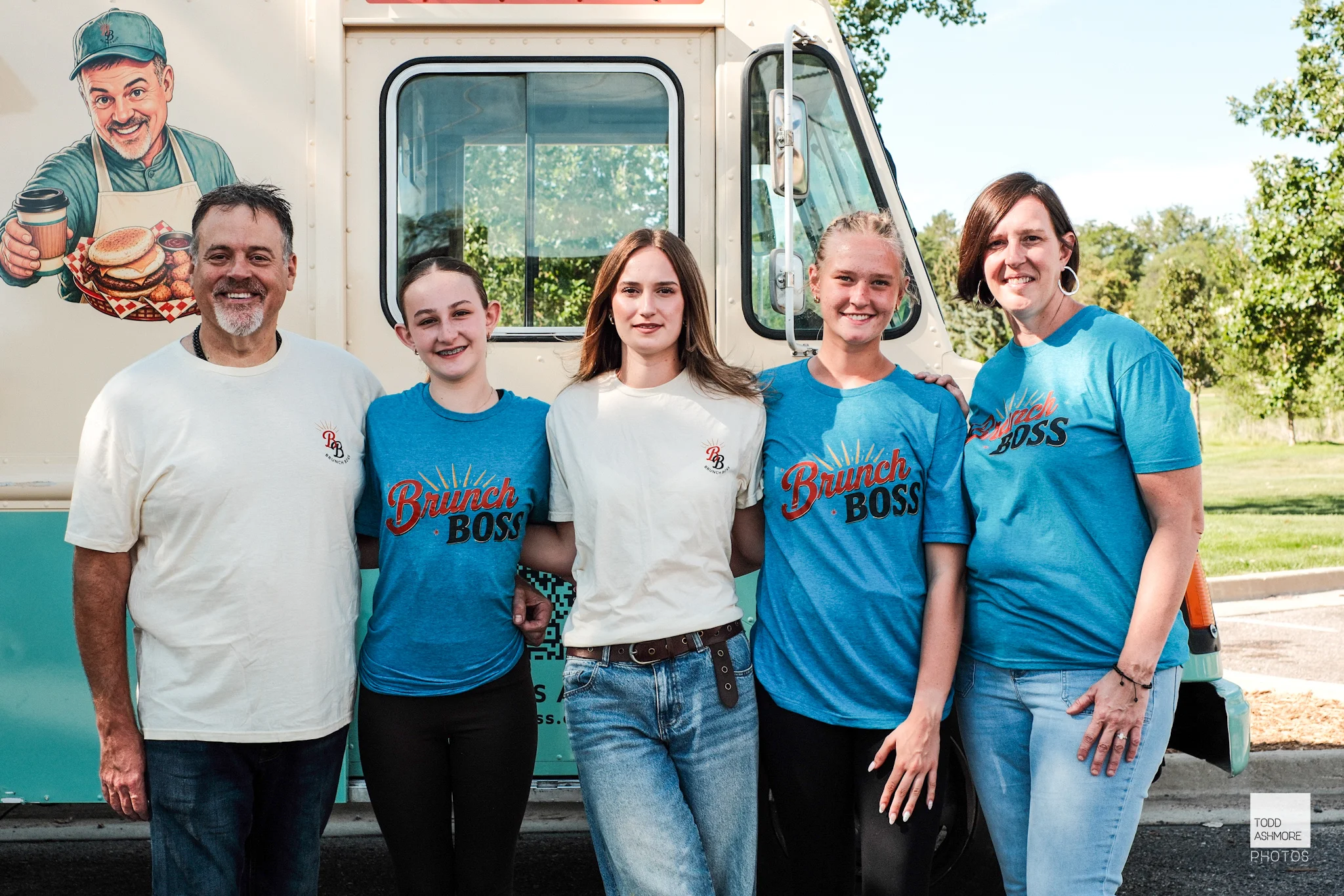Brunch Boss food truck team posing together outdoors