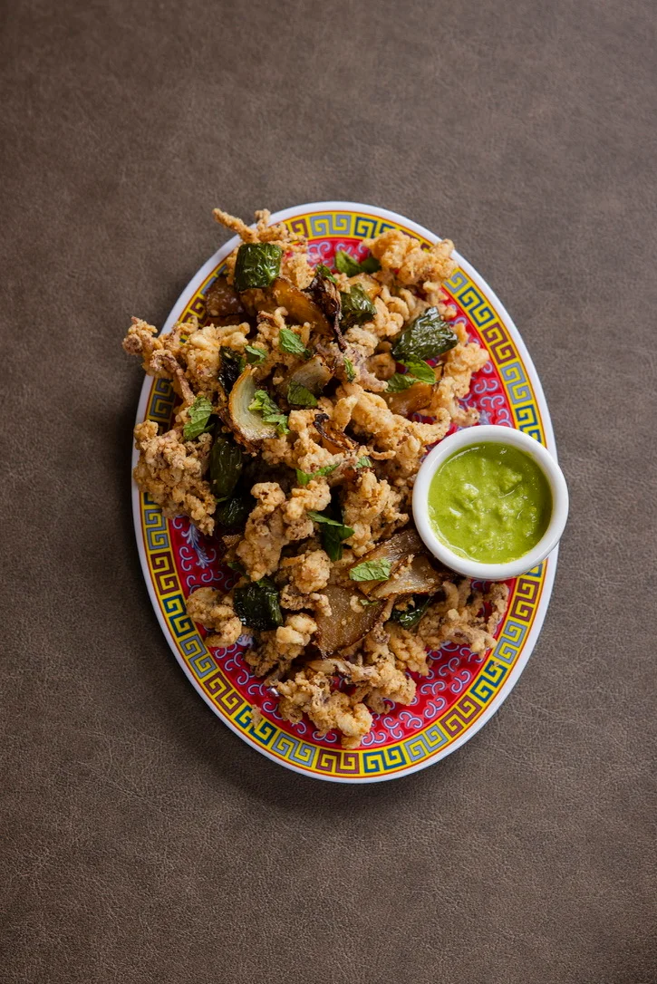 Crispy fried calamari with green sauce