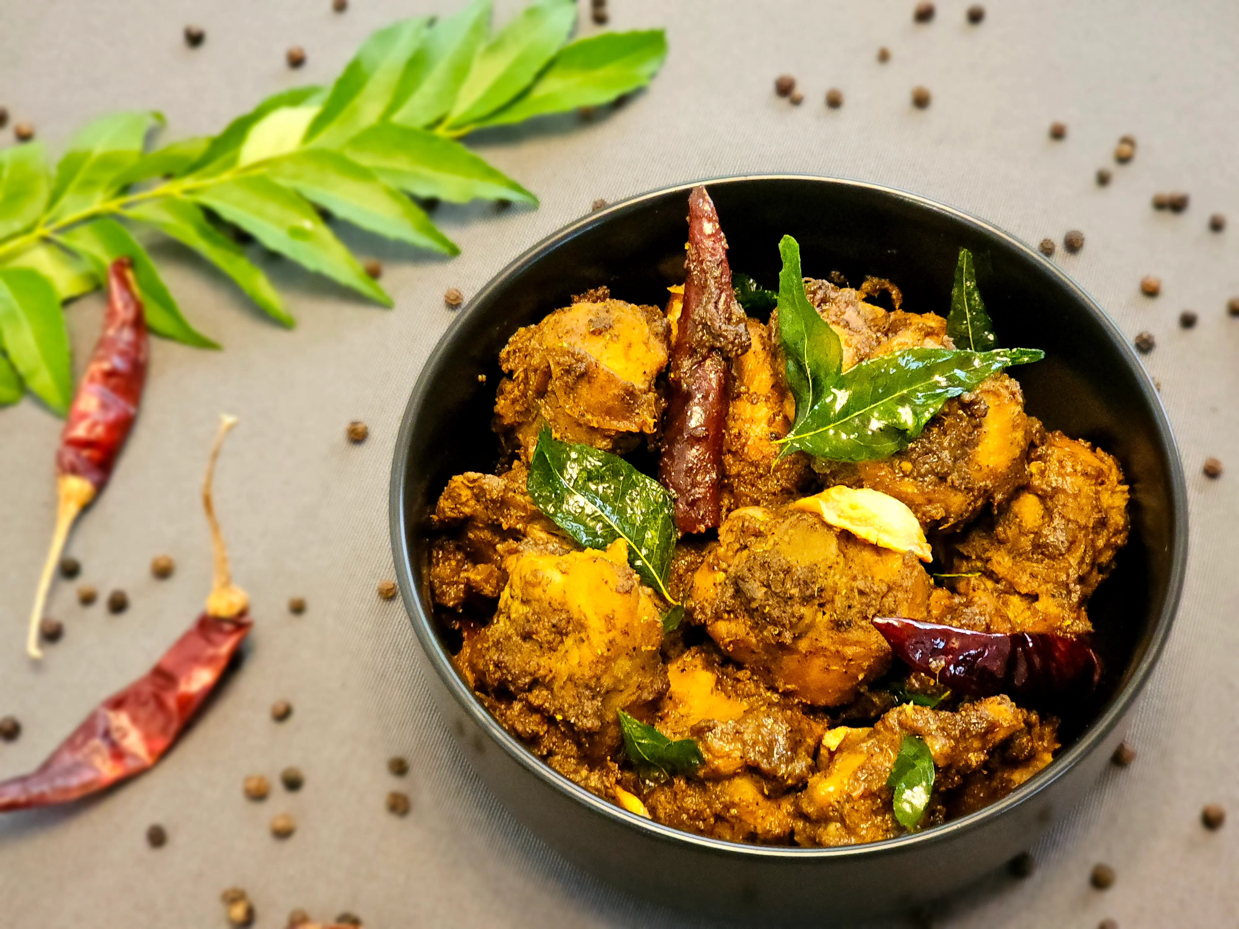 Spicy South Indian chicken curry with curry leaves