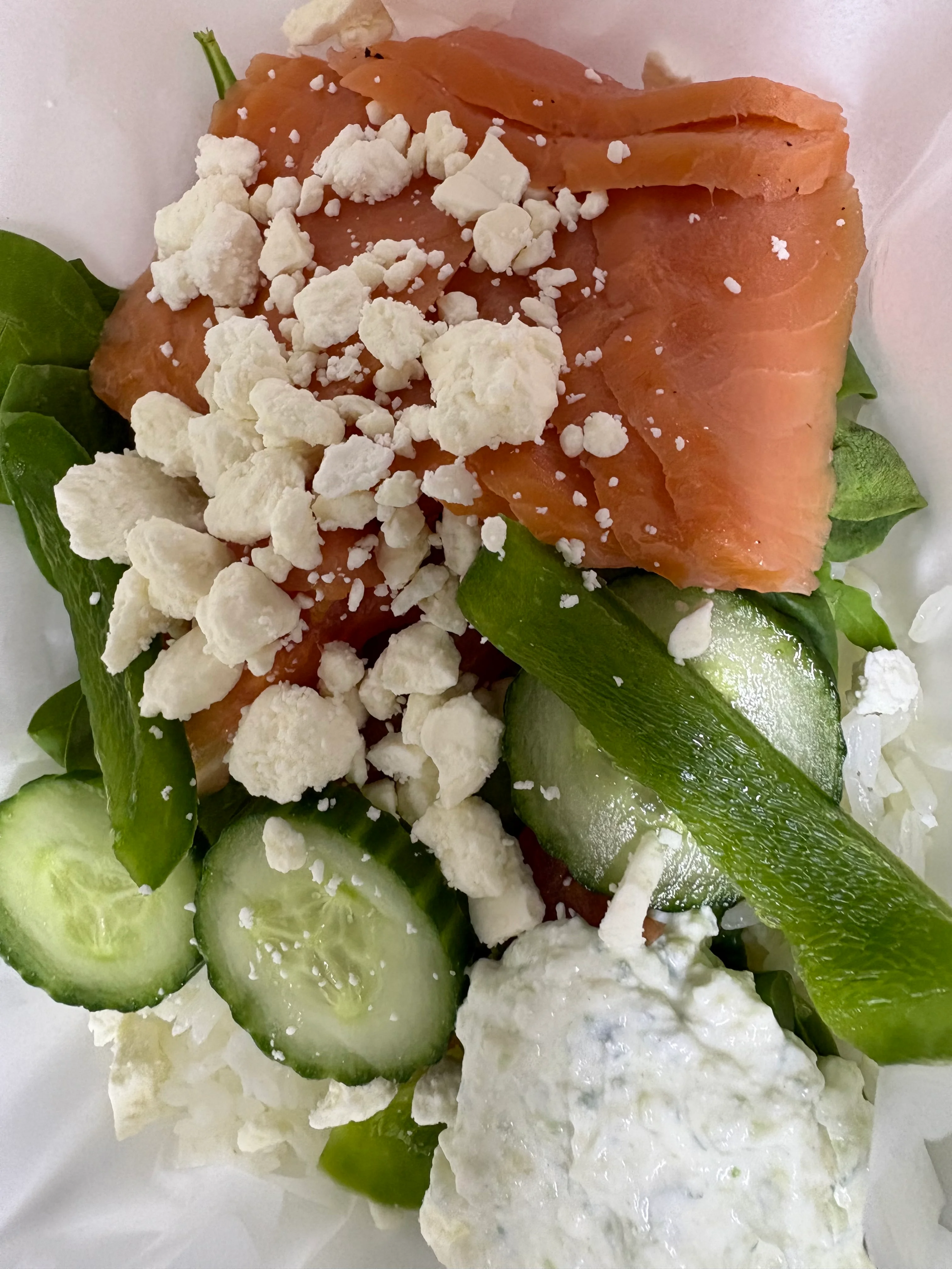 Mediterranean salad with smoked salmon and feta cheese