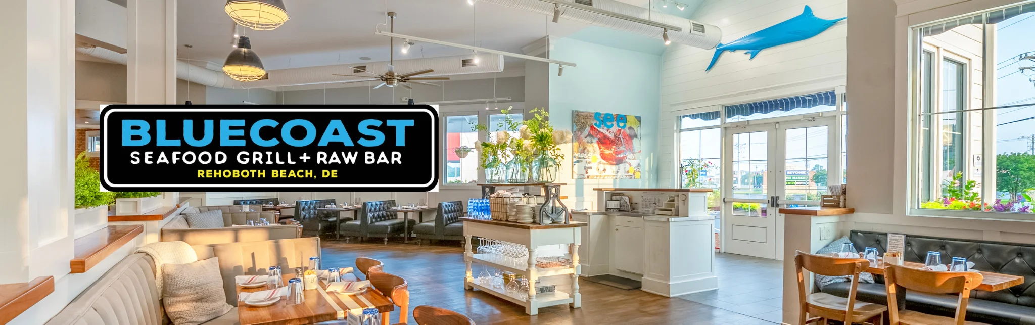 Interior of Bluecoast Seafood Grill with dining area and decor.