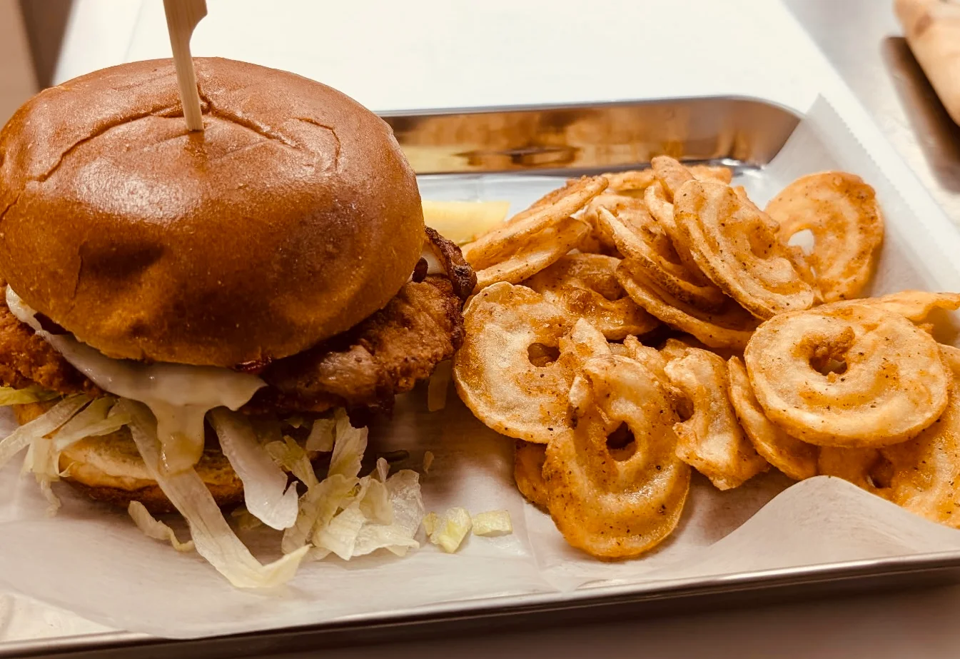 Crispy fried chicken sandwich with seasoned potato chips