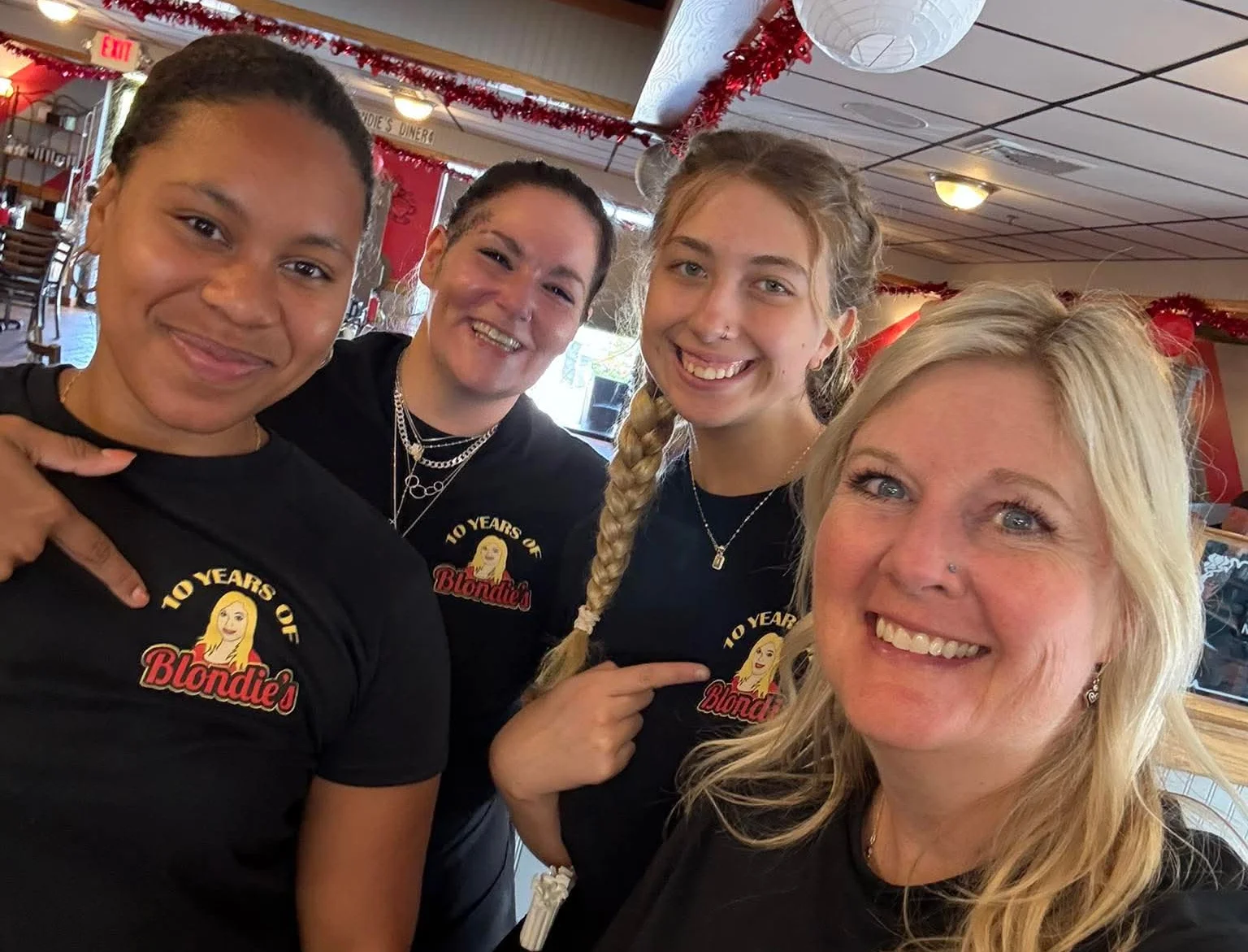 Staff celebrating 10 years at Blondie's restaurant