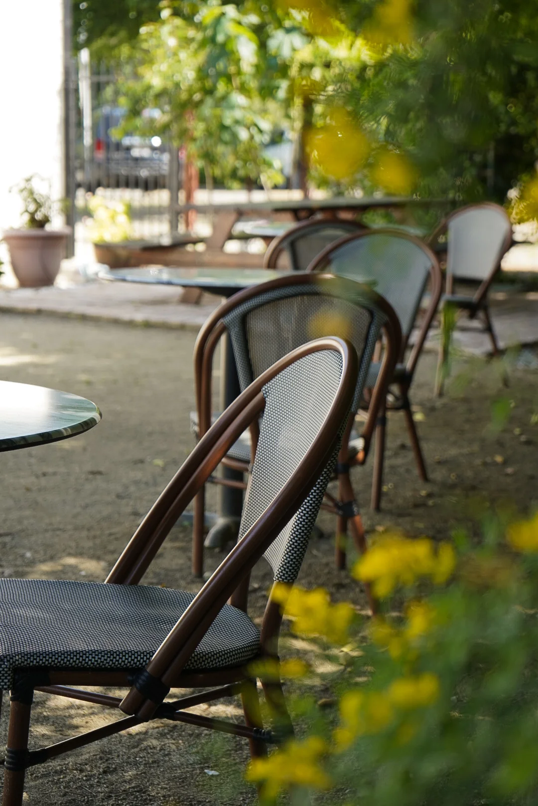 Charming outdoor dining area with stylish chairs