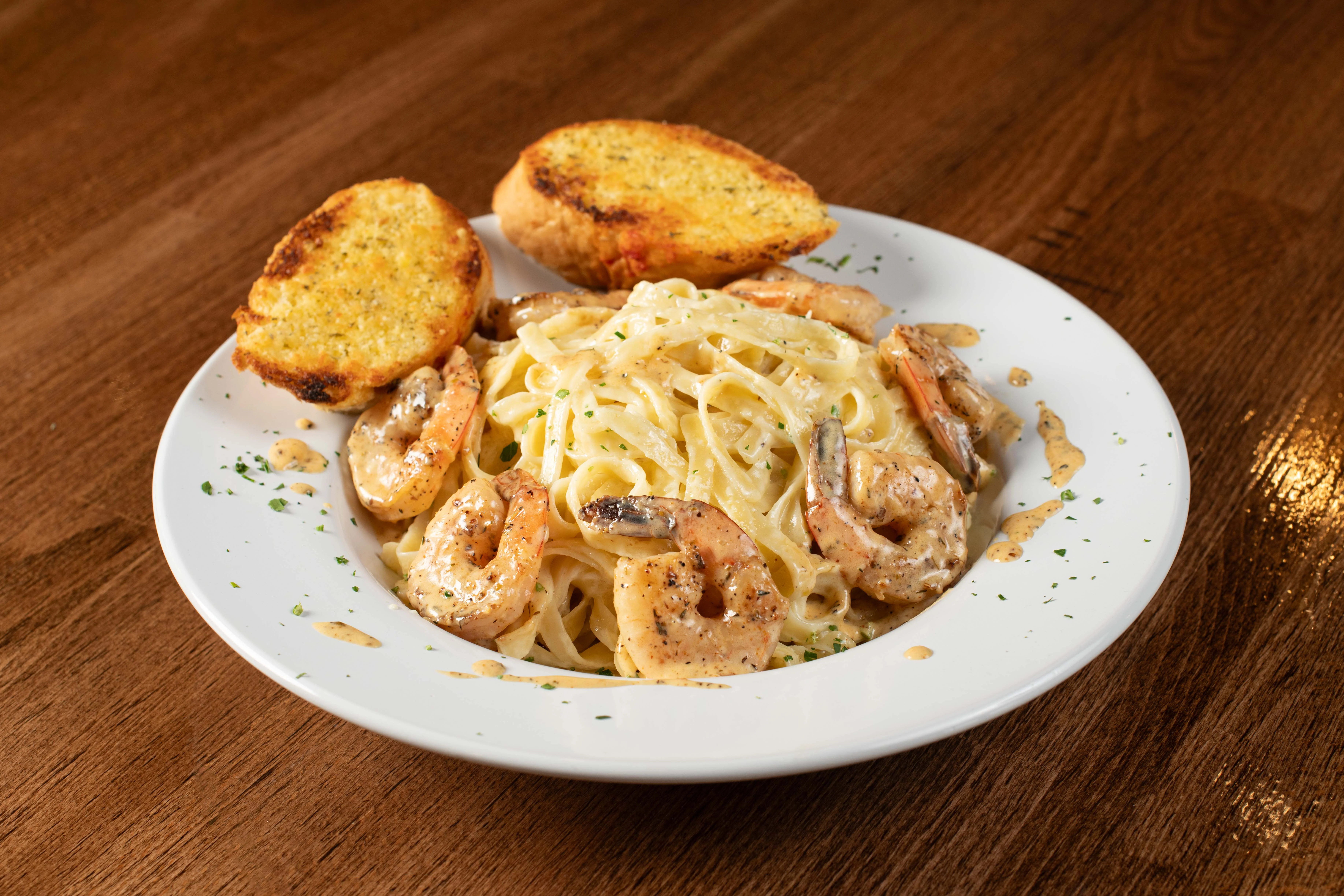 Shrimp fettuccine Alfredo with garlic bread