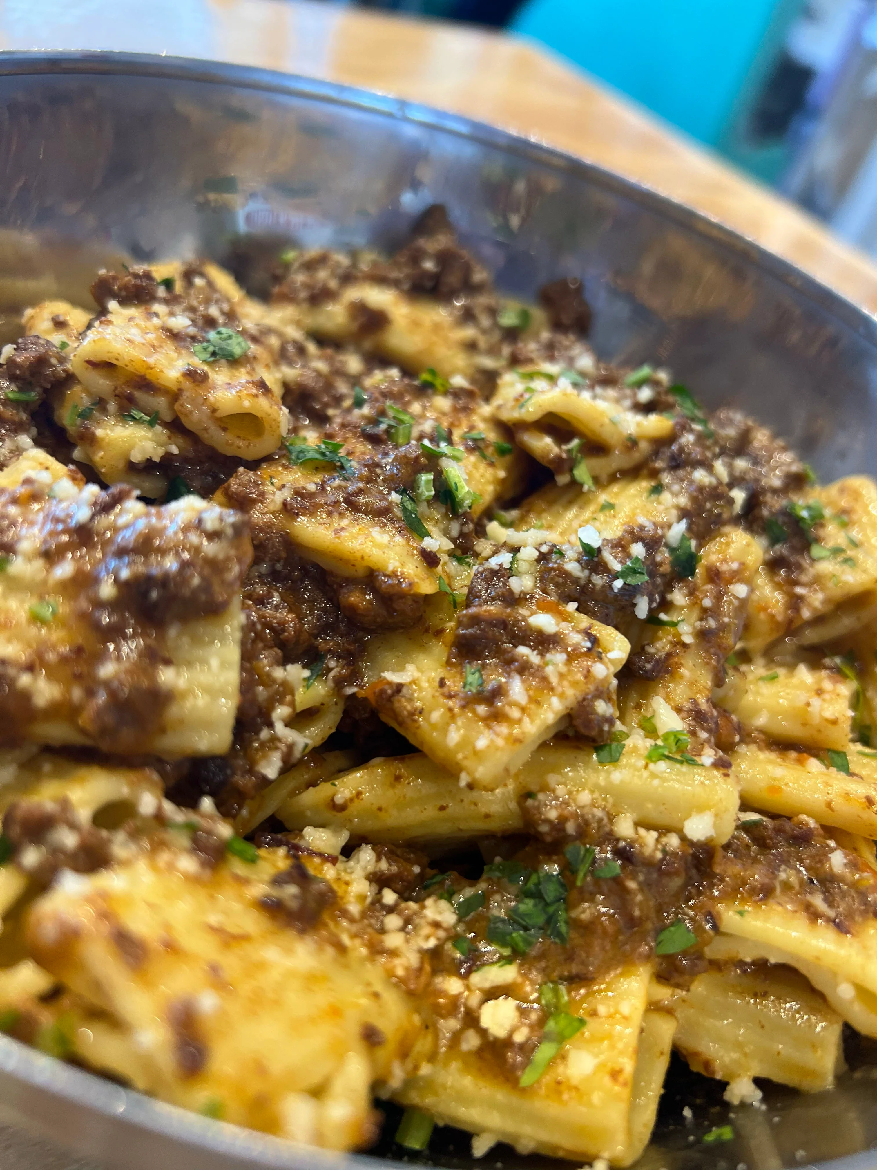 Rich Italian ragù pasta in a bowl