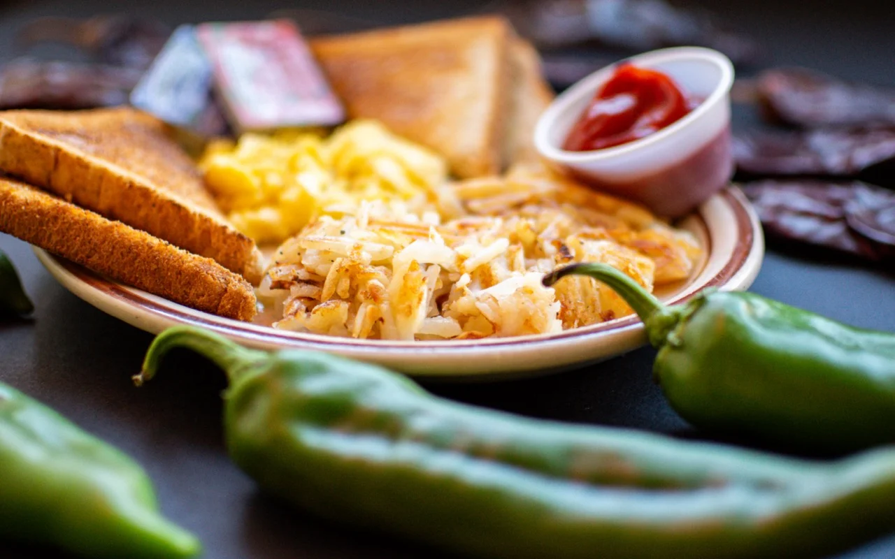 Classic American breakfast plate with hash browns and toast