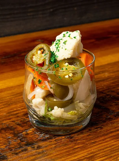 Mexican pickled vegetables in a glass jar