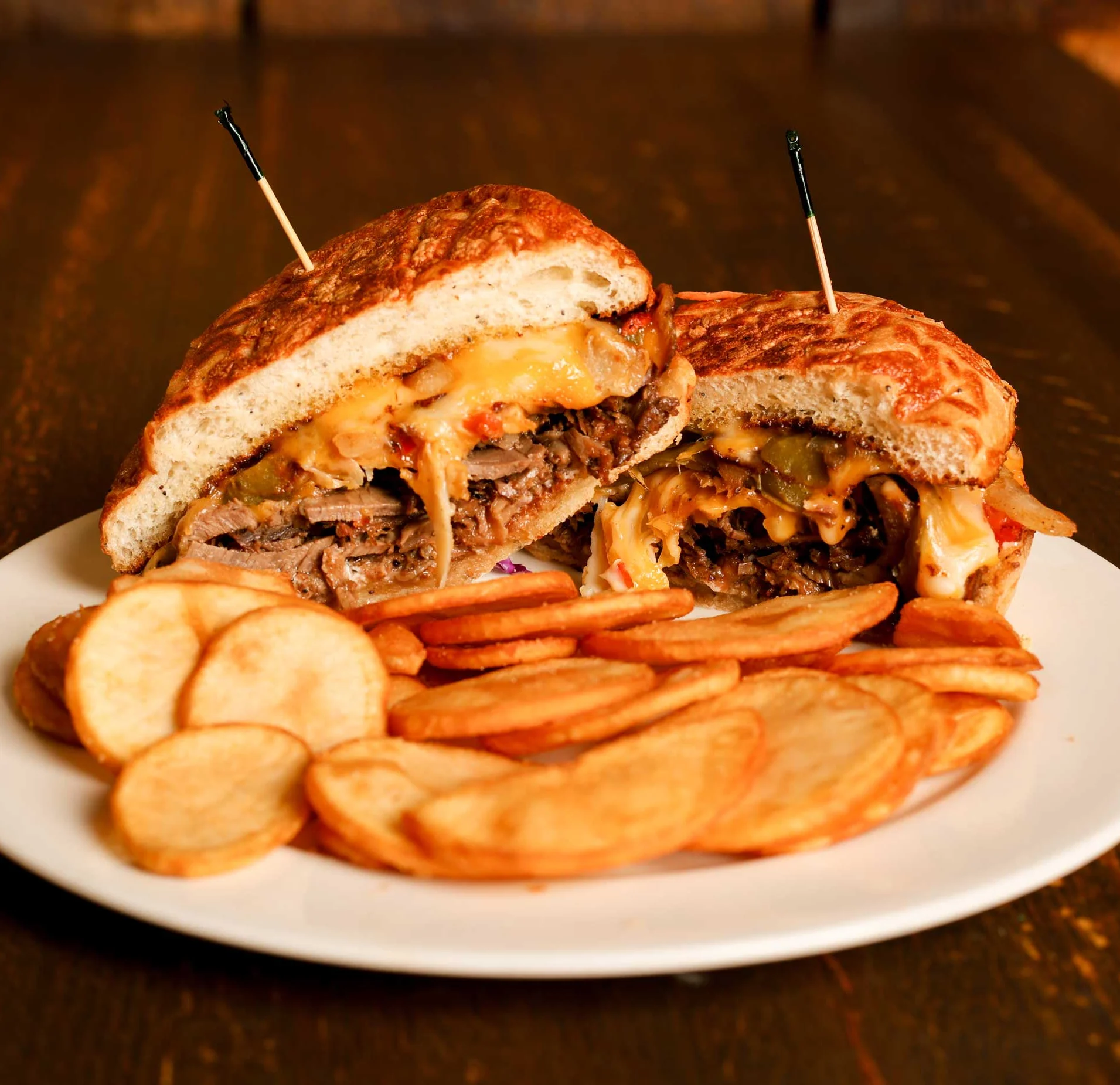 Loaded cheesesteak sandwich with crispy chips