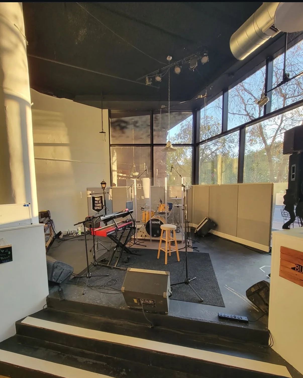 Live music stage setup in a modern restaurant