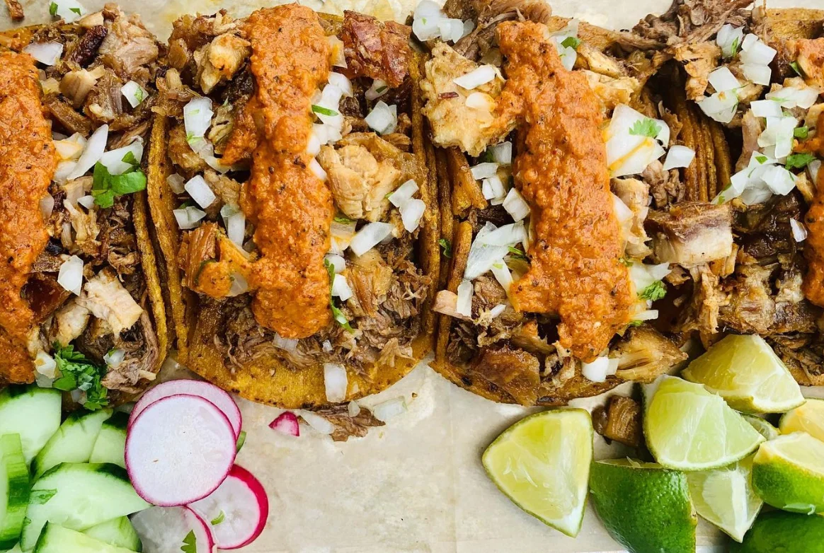 Authentic Mexican tacos with slow-cooked meat and spicy sauce
