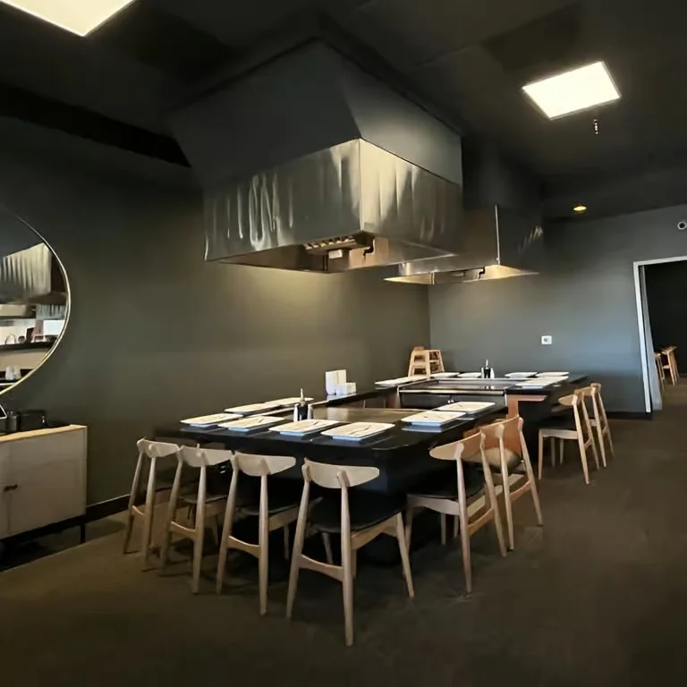 Delicious gourmet burger with fresh toppings on a wooden table