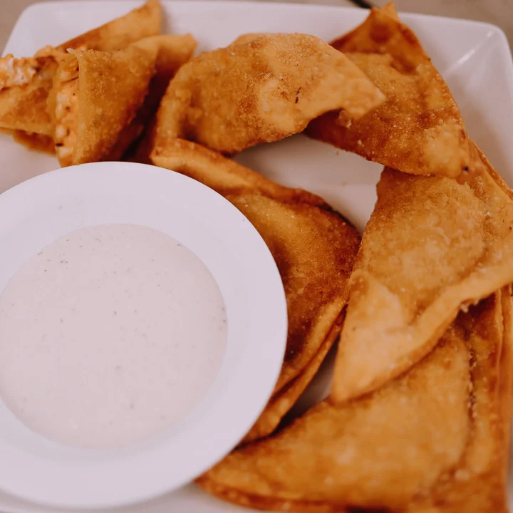 Crispy fried wontons served with dipping sauce
