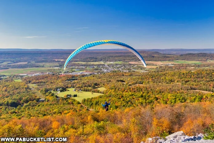 A scenic view of fall foliage from a hang glider launch site in McConnellsburg.