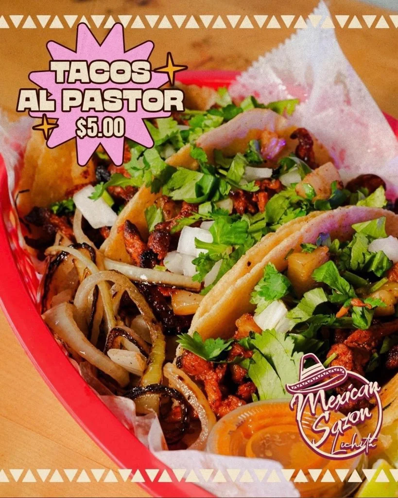 Authentic Mexican tacos al pastor served with onions and cilantro