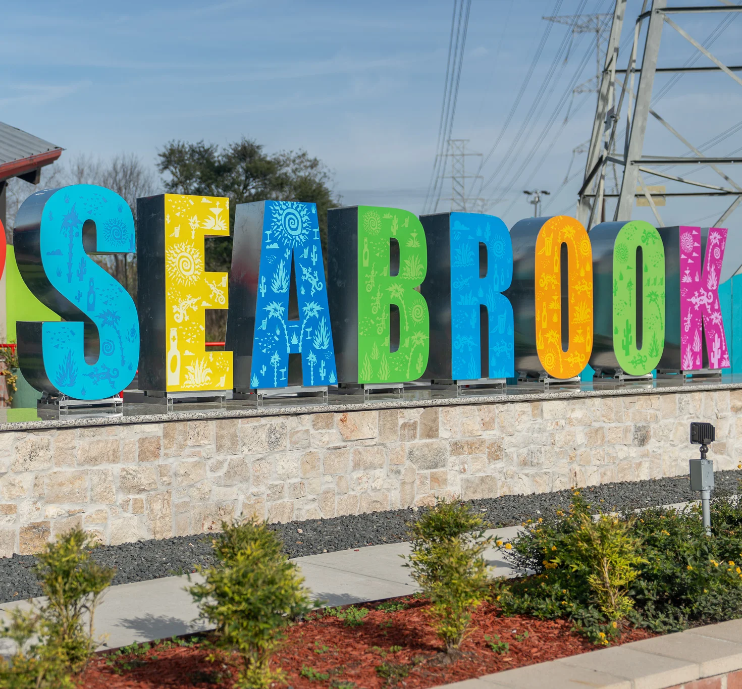 Colorful 'I Love Seabrook' sign in a vibrant outdoor setting