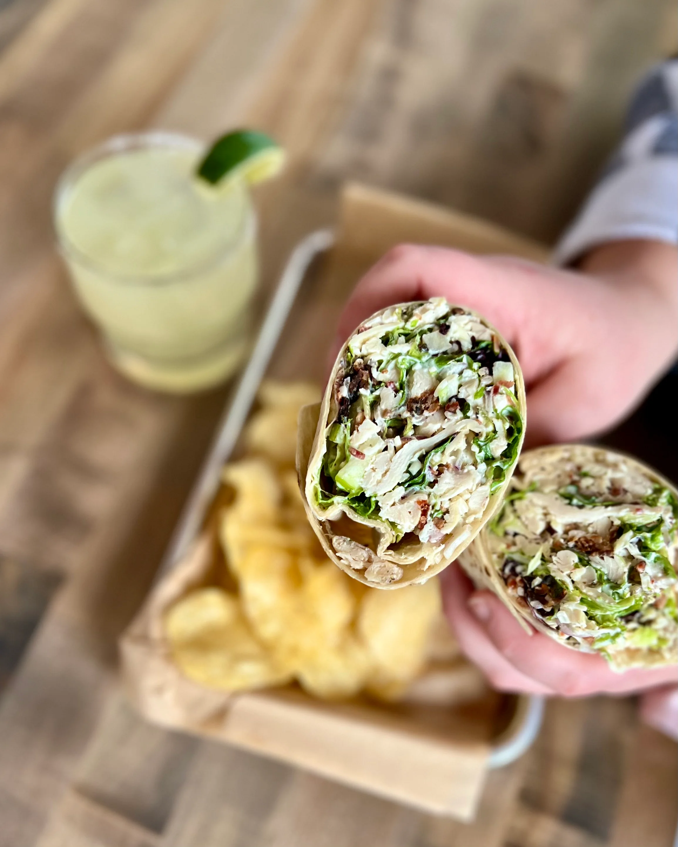 Fresh chicken burrito with lettuce and black beans