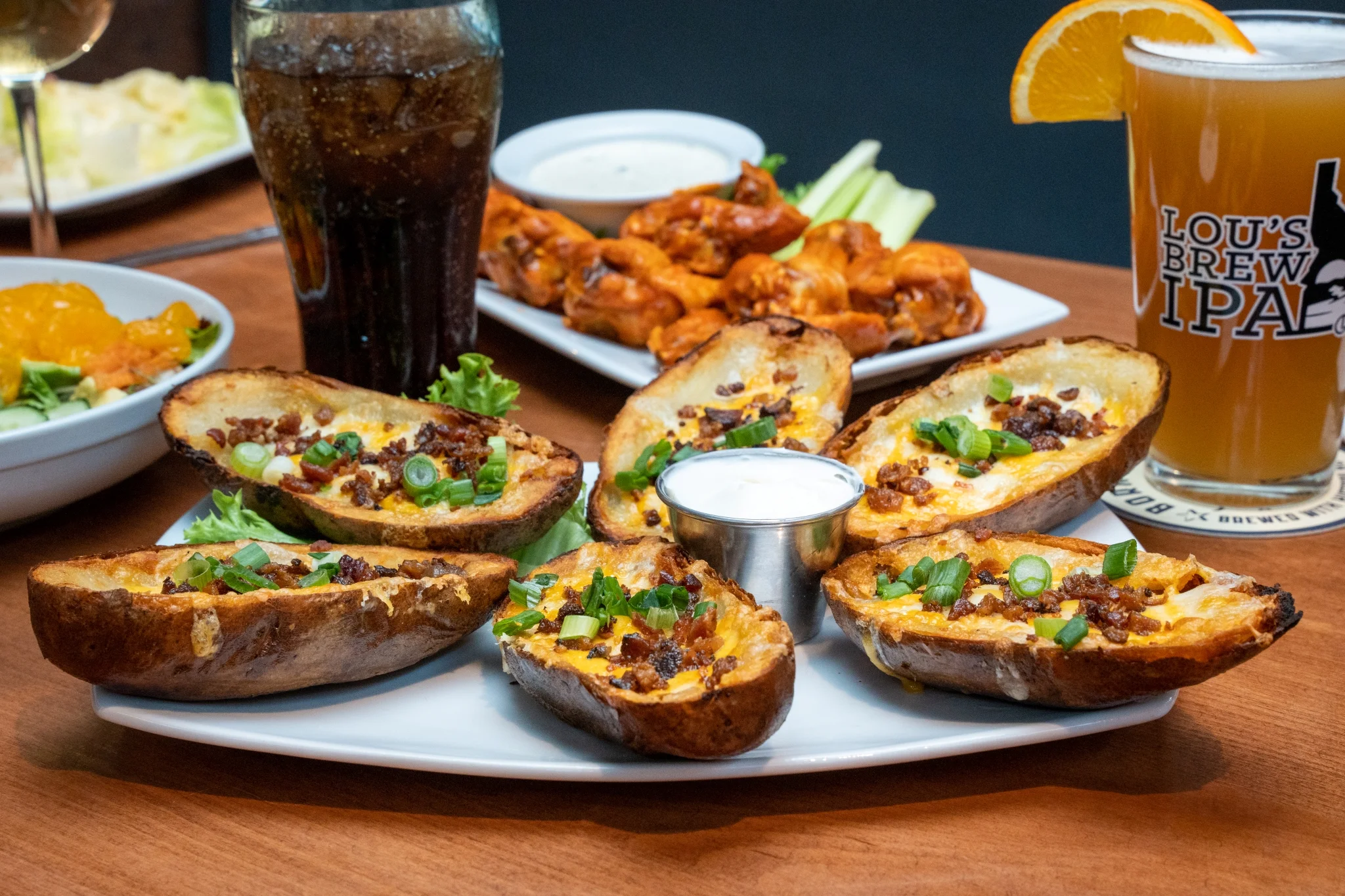 Loaded potato skins served with ranch dressing