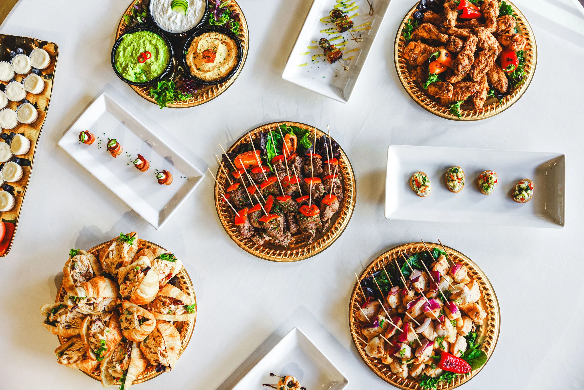 Assorted Mediterranean mezze platter with skewers and dips