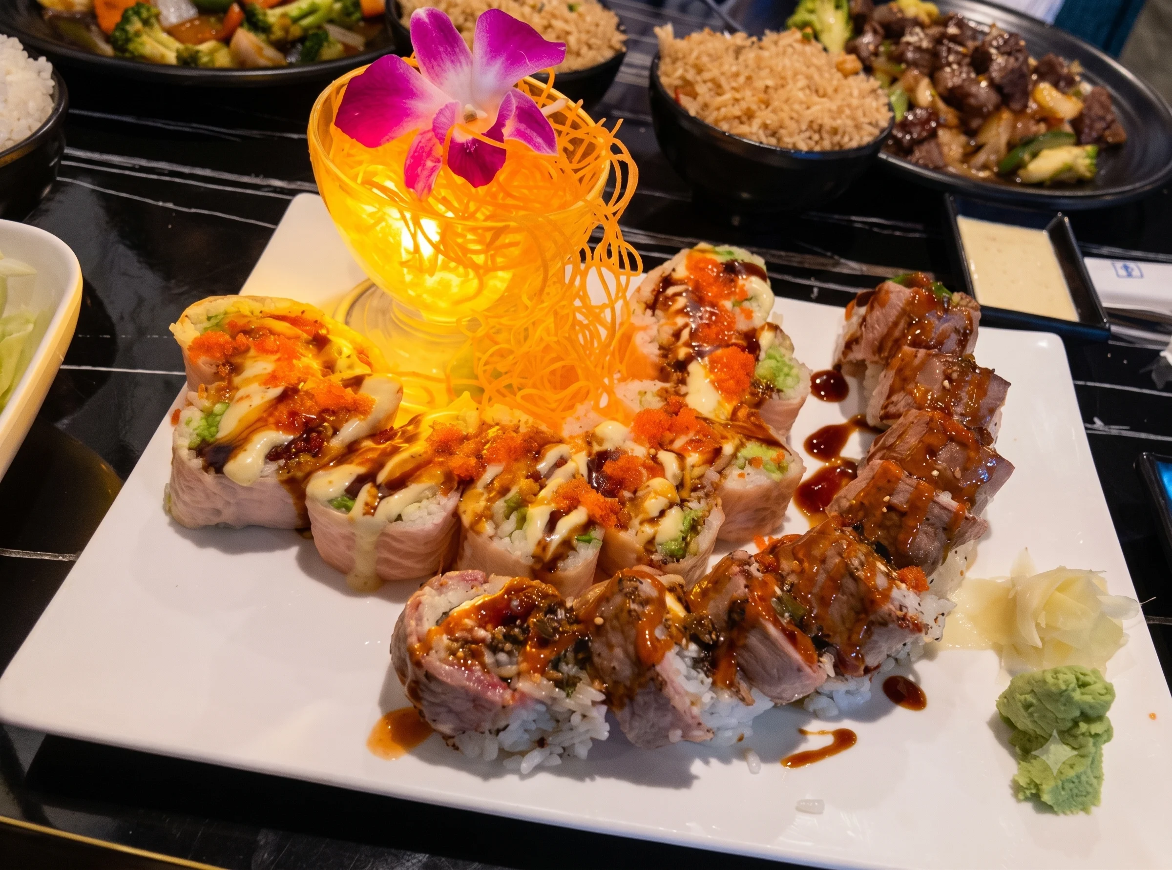 Artfully arranged sushi platter with colorful rolls