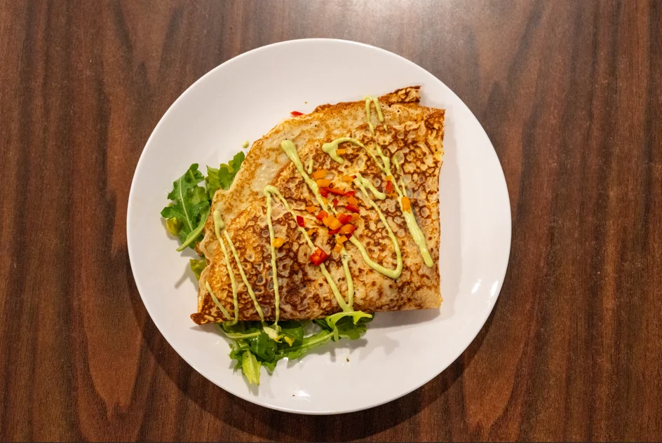 Savory French galette with greens and sauce
