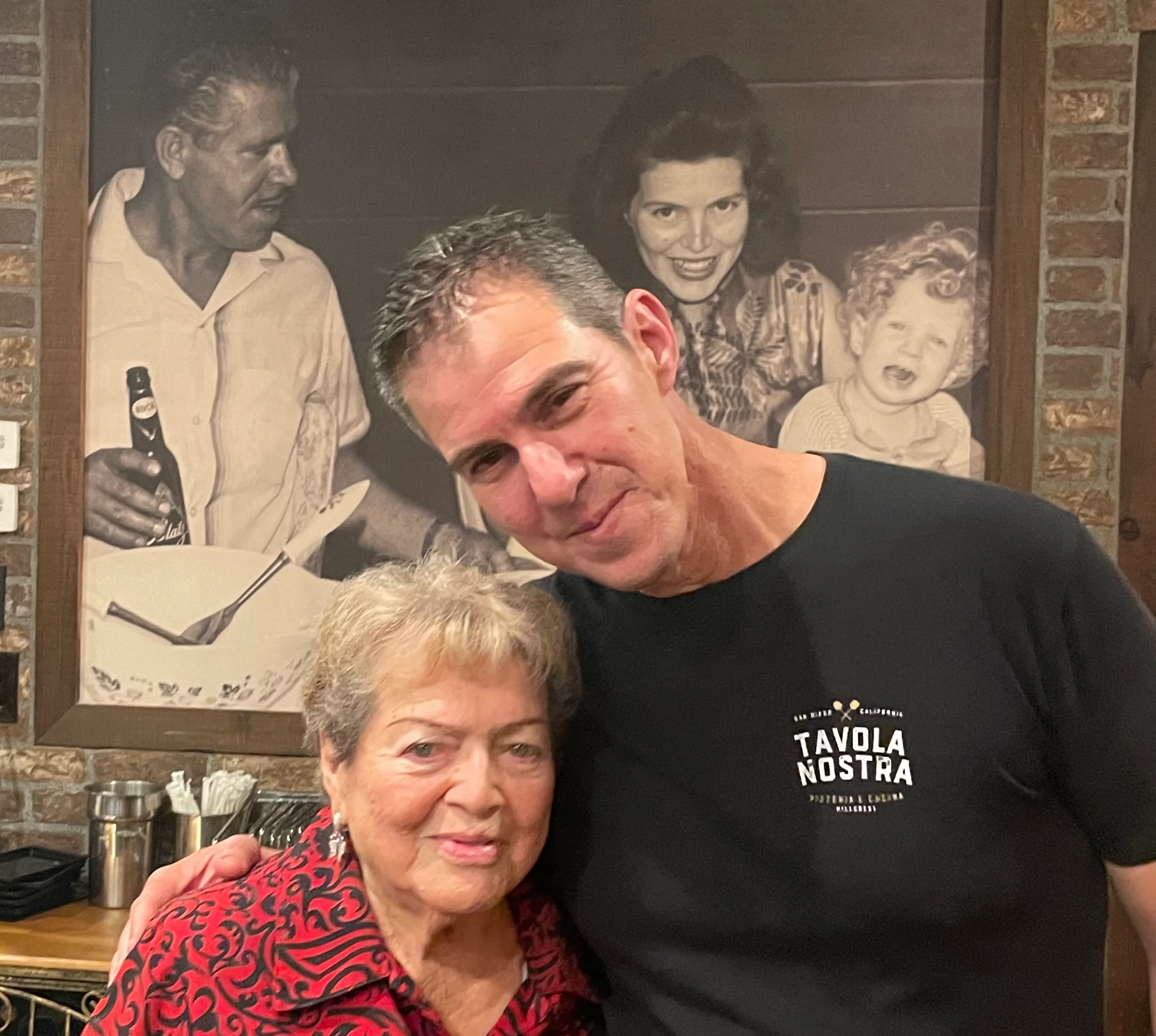 Warm restaurant atmosphere with smiling guests