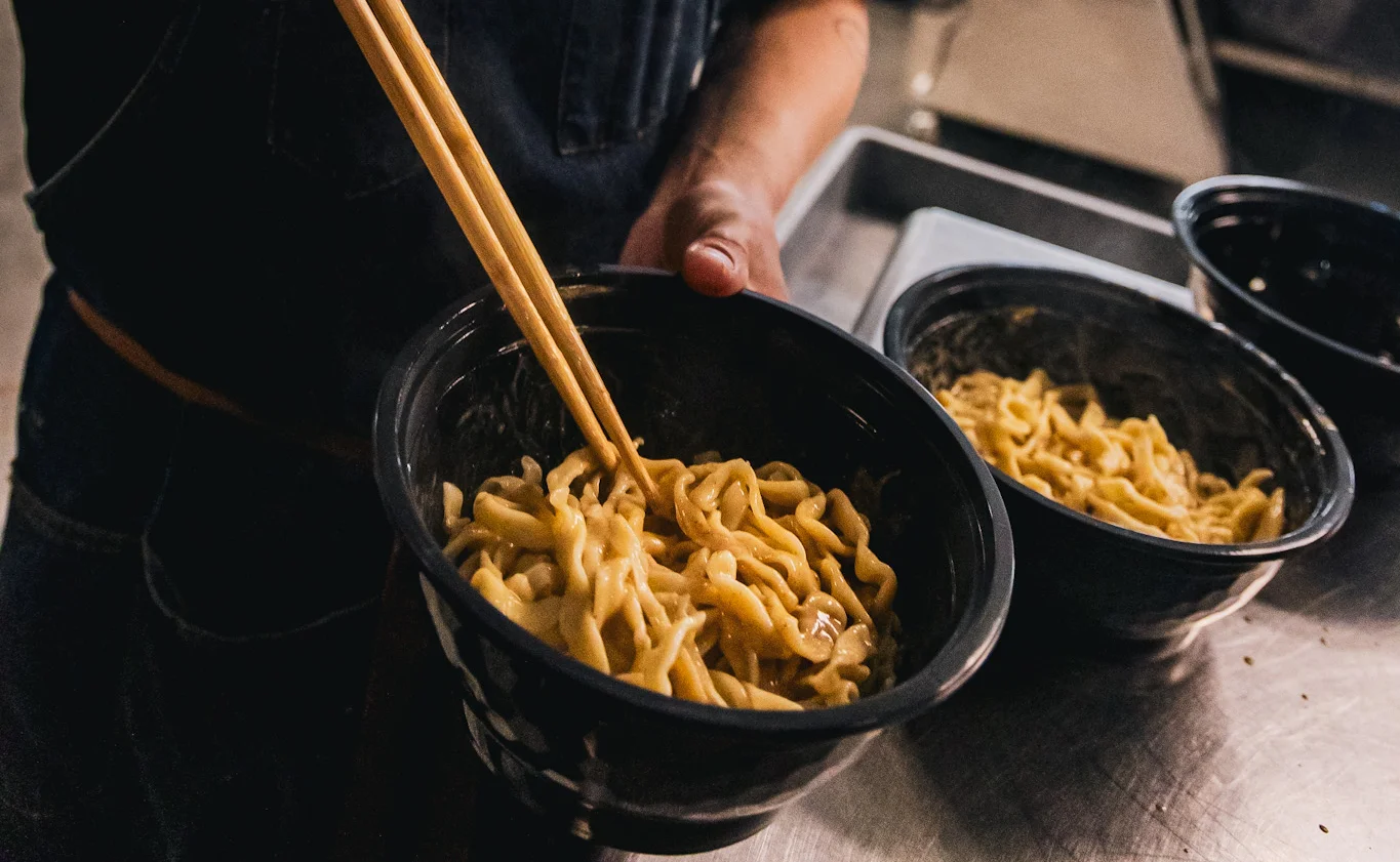 A restaurant chef preparing a dish