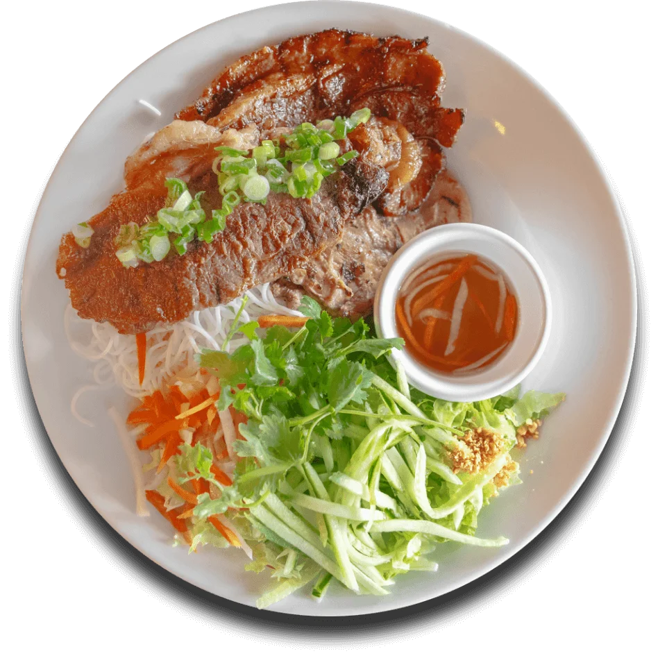 Vietnamese bun thit nuong with grilled pork and fresh herbs