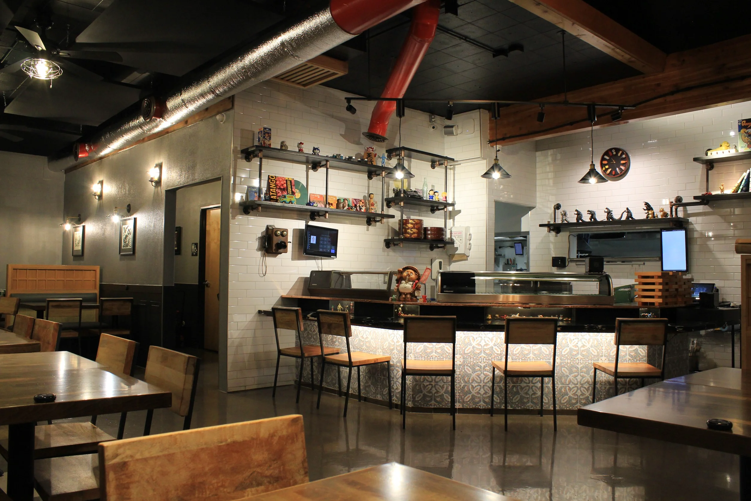 Modern restaurant interior with stylish decor and bar seating