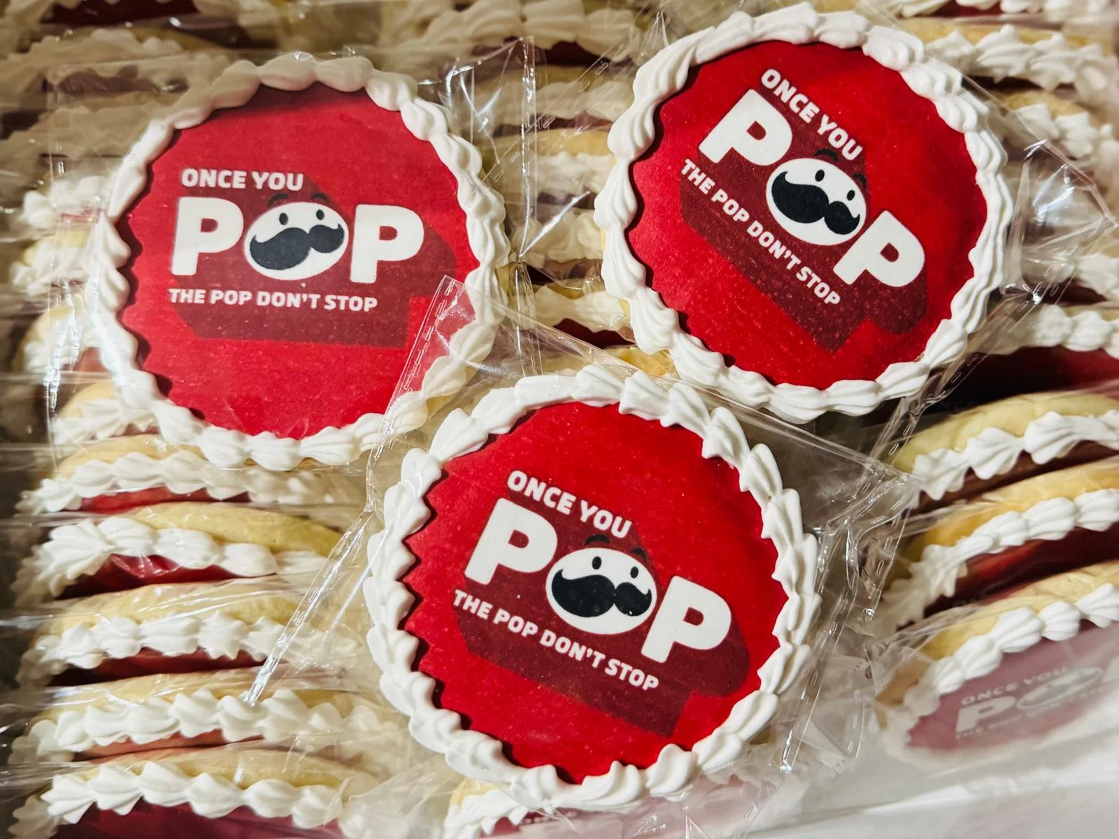 Decorative cookies with playful branding and icing