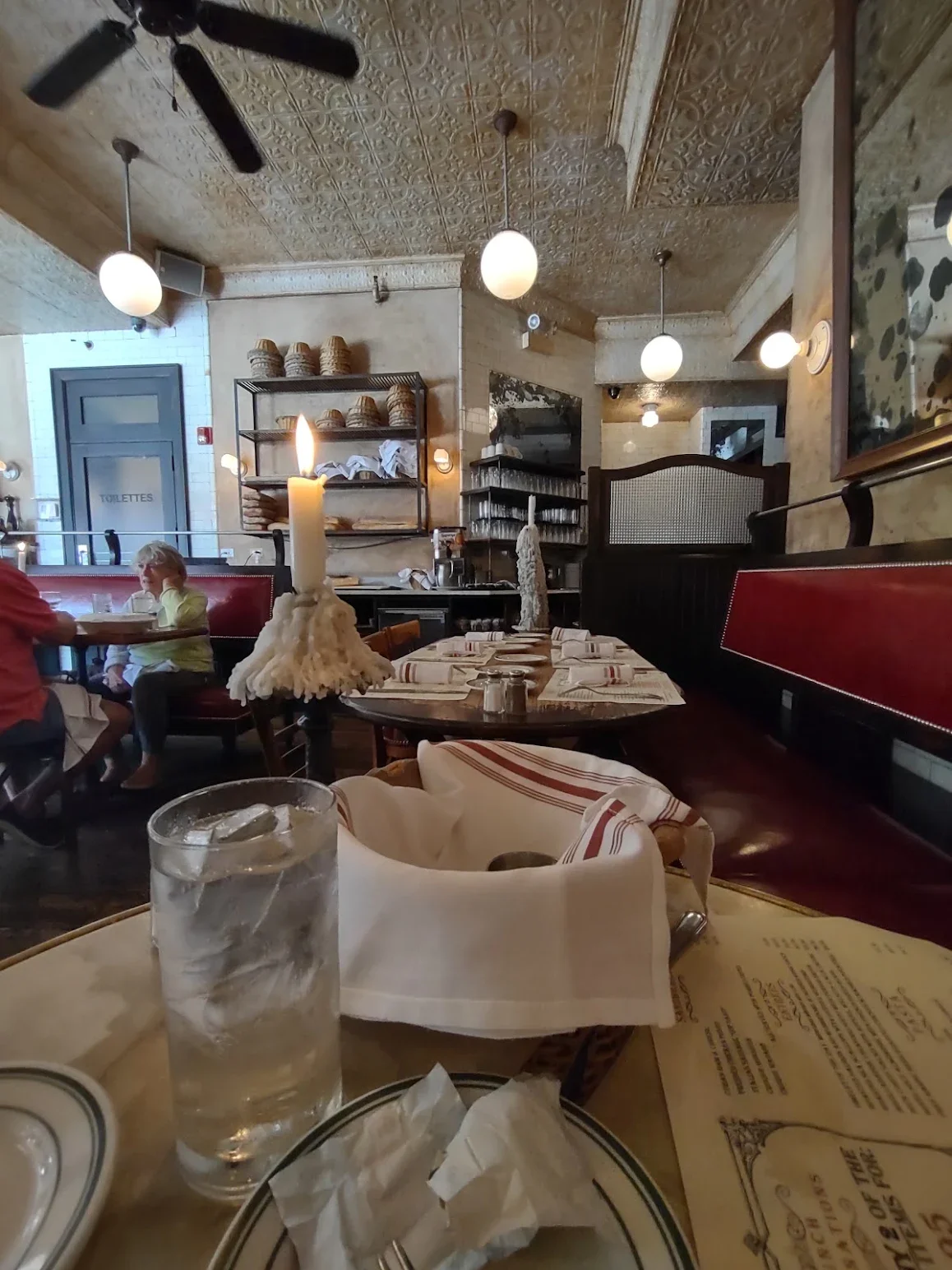 Cozy restaurant interior with candlelight and vintage decor