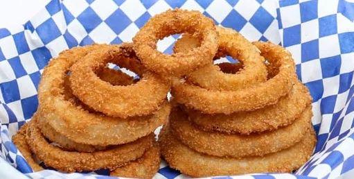 Crispy onion rings served in a basket