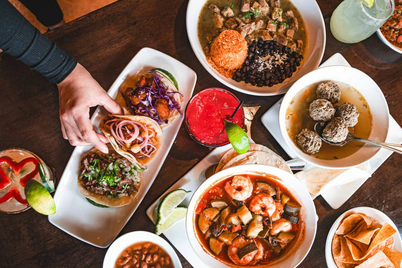 Colorful Mexican taco platter with shrimp and beef