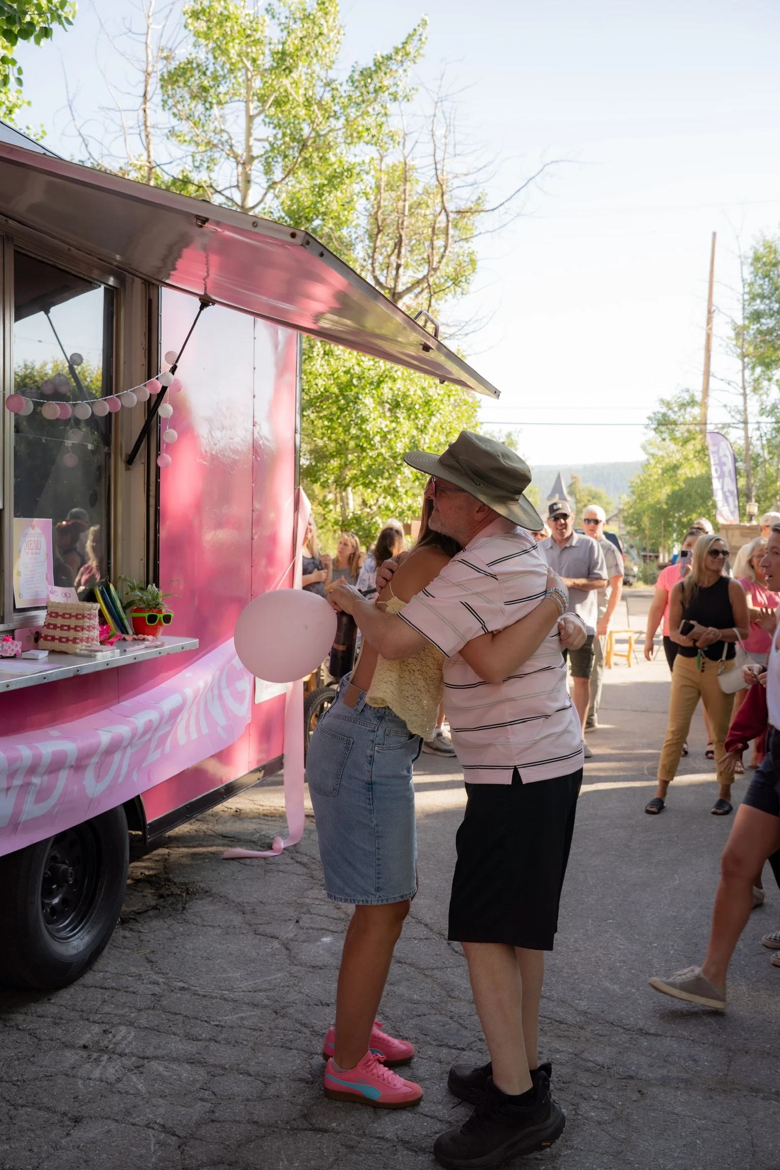 Celebratory moment at a food truck opening event