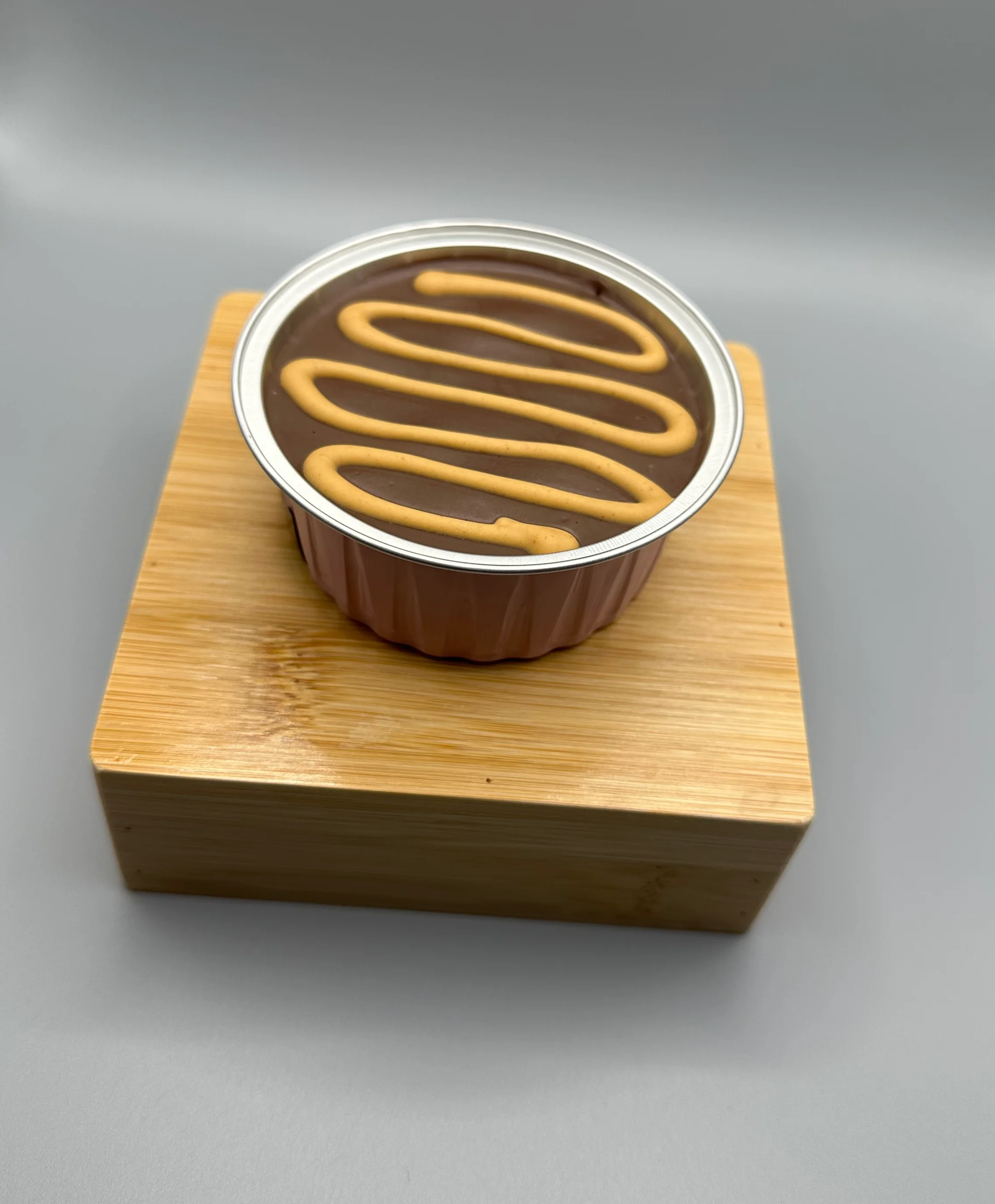 Delicious gourmet burger with fresh toppings on a wooden table