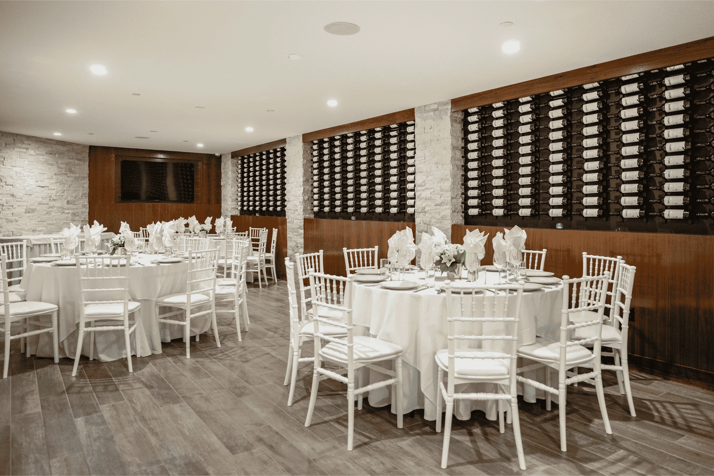 Elegant restaurant dining area with wine display
