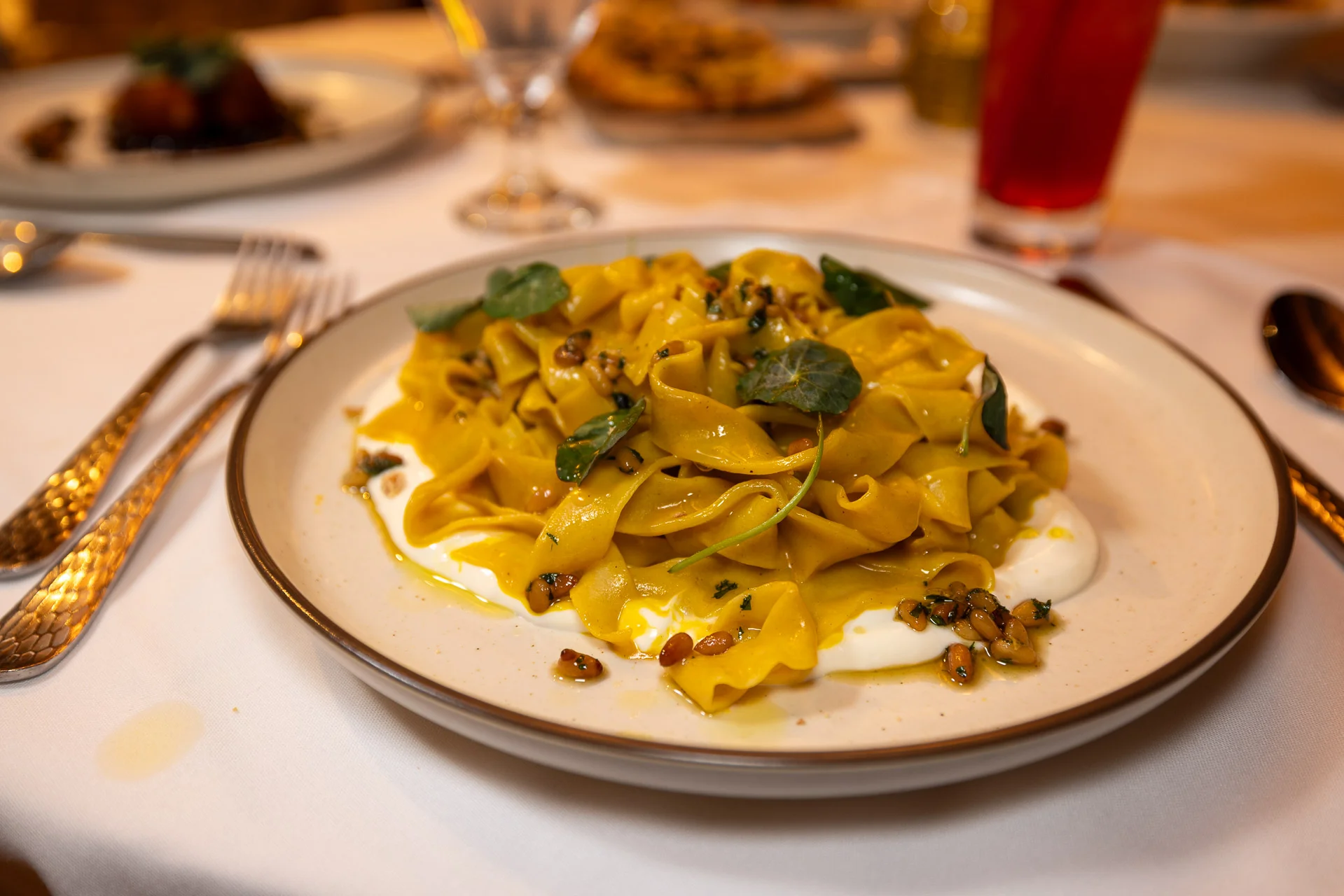Delicious plate of spaghetti Bolognese garnished with herbs.