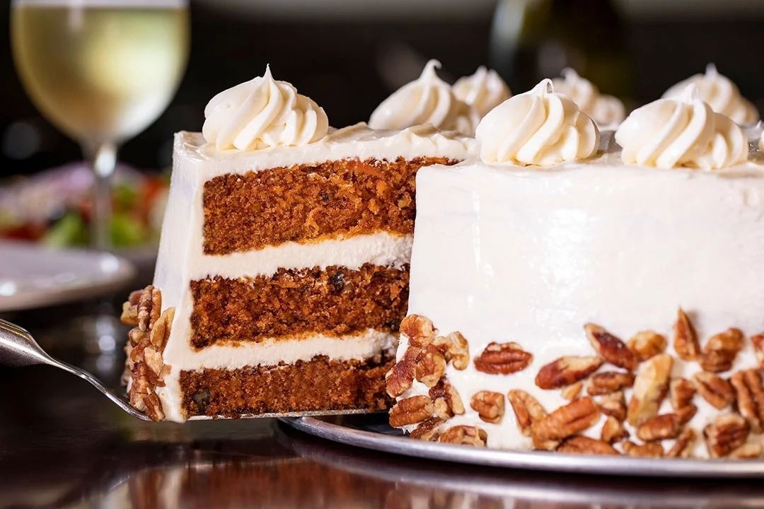 Delicious carrot cake with cream cheese frosting and pecans