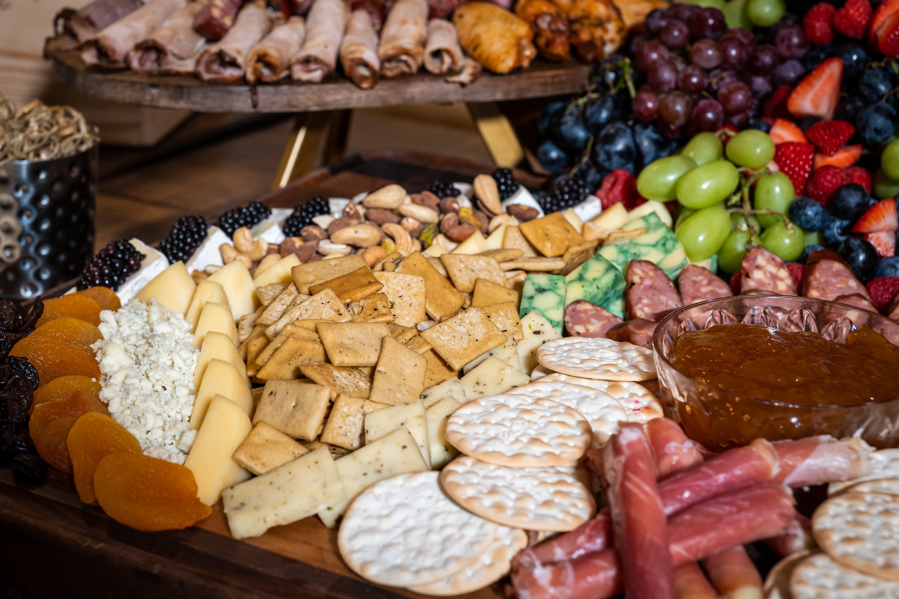 Artisan charcuterie board with assorted cheeses and fruits