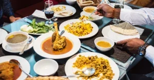 Indian meal with biryani, curries and naan