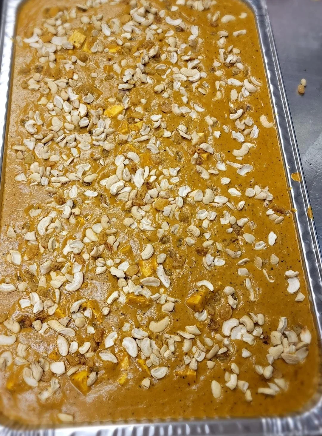 Indian besan burfi topped with cashews