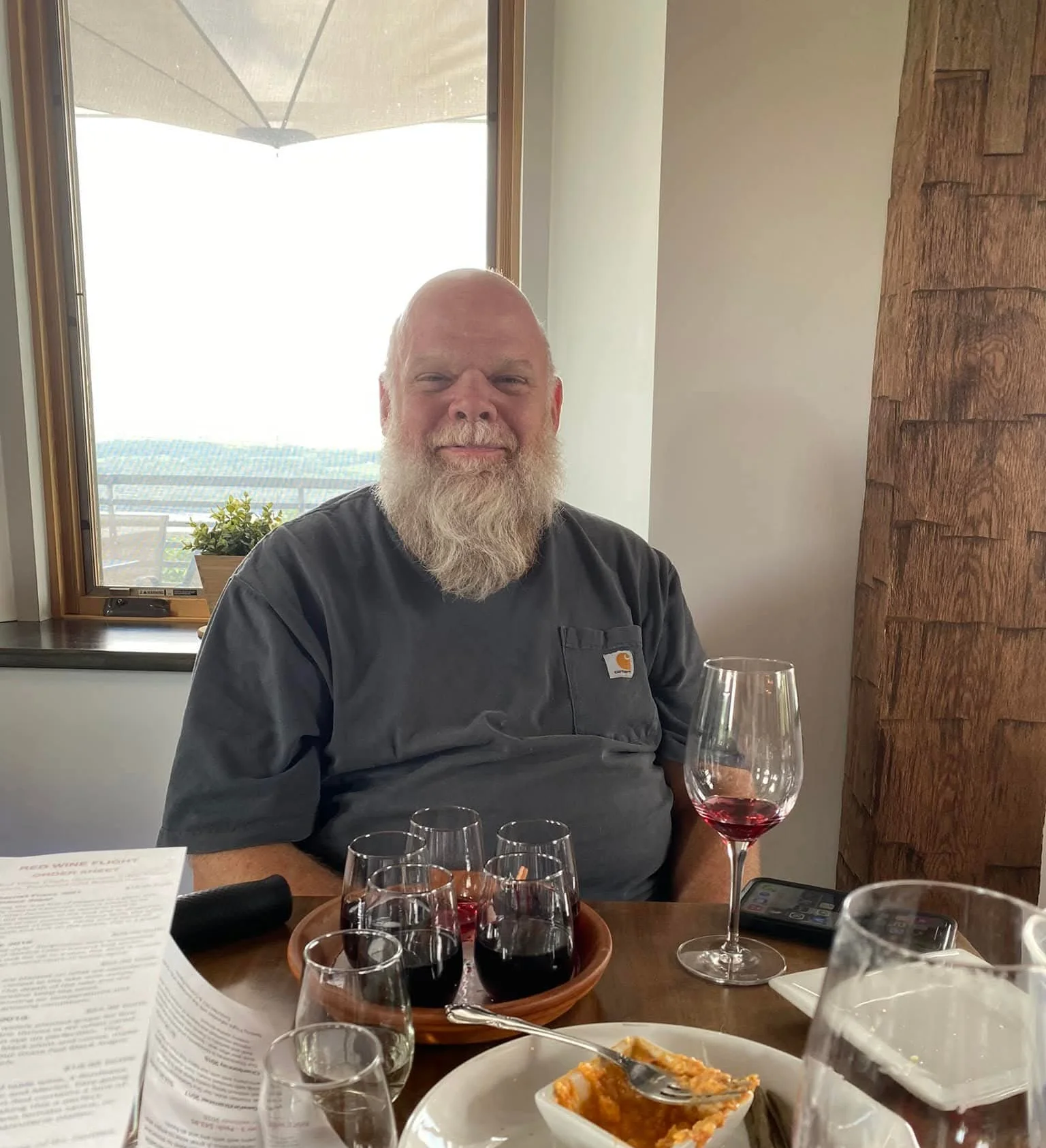 Cozy restaurant setting with wine tasting and small plates