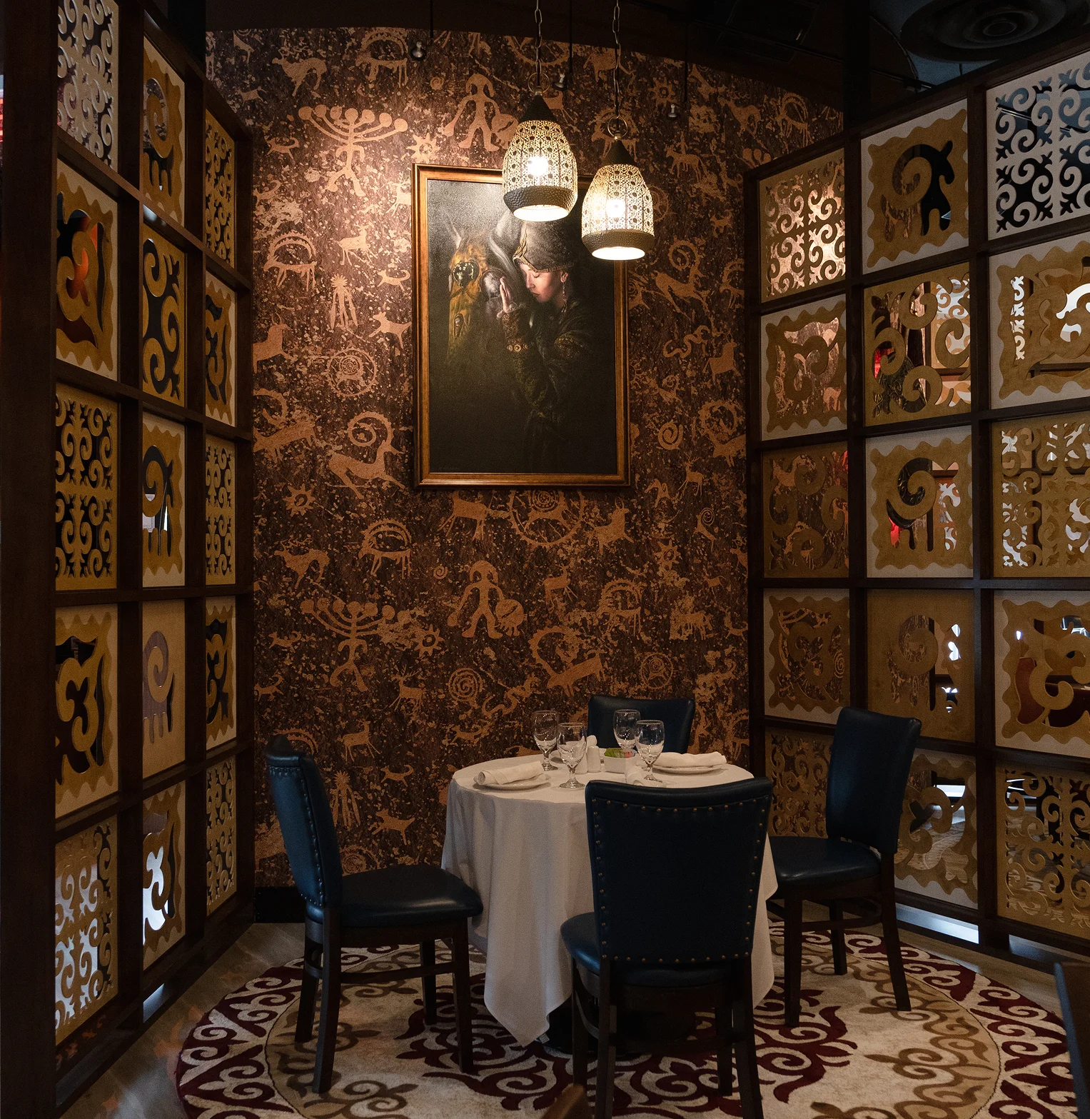 Elegant restaurant booth with artistic decor and intimate lighting