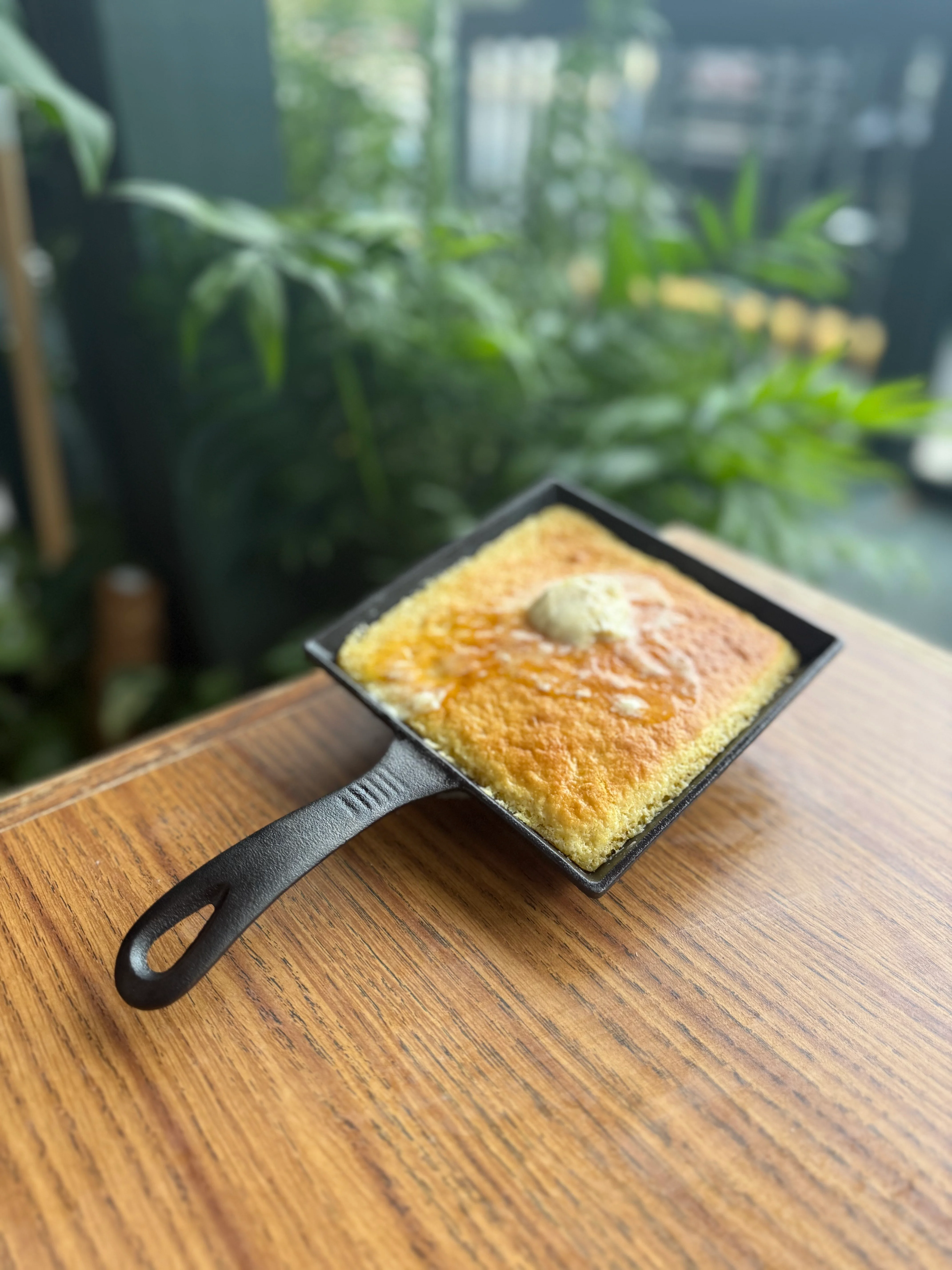 Freshly baked cornbread in a cast iron skillet