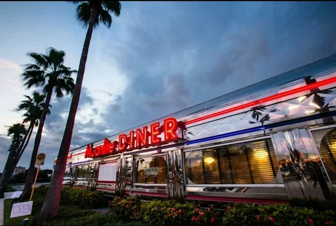 Classic American diner exterior with neon lights